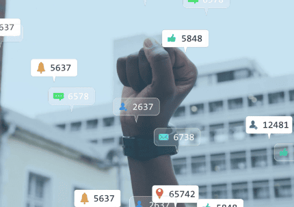 Social media engagement metrics with hand holding camera